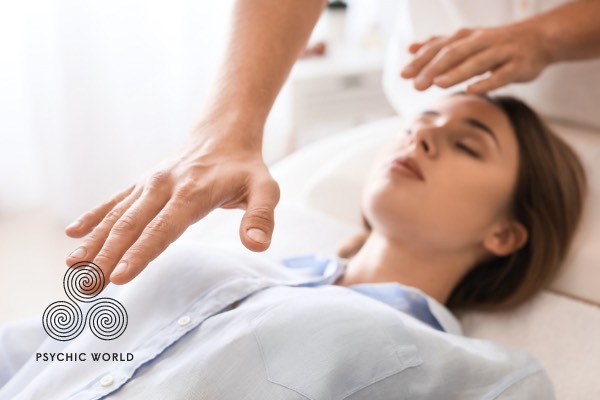reiki reading on a woman laying down relaxing 