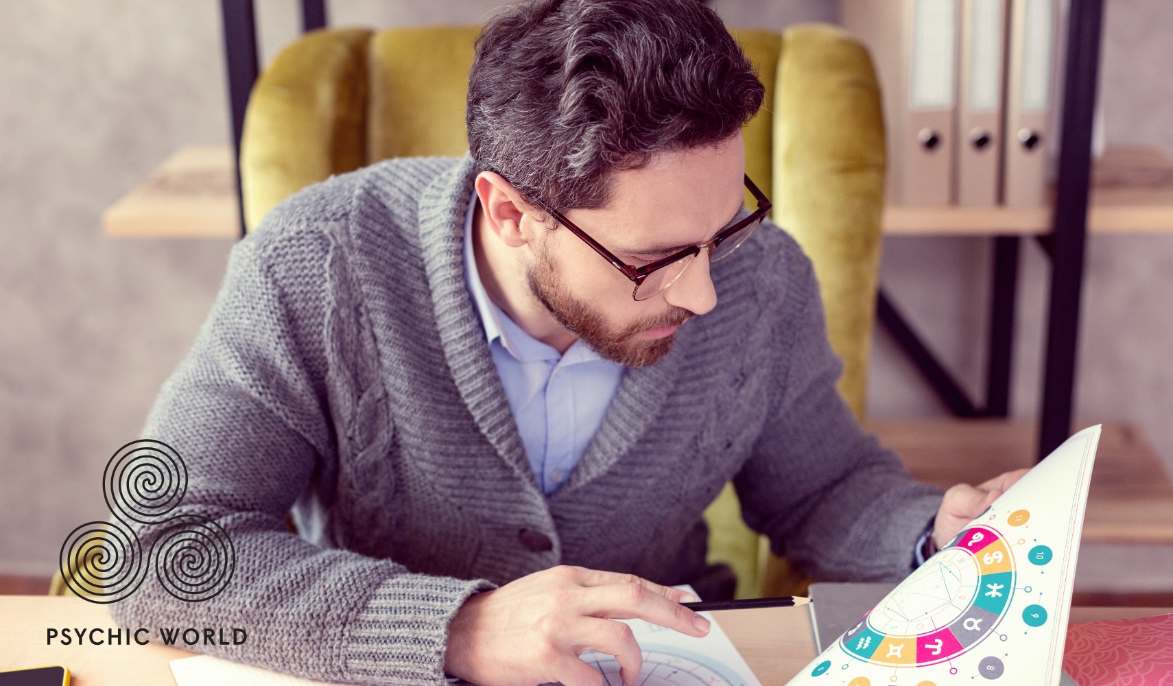 man with glasses reading vedic astrology 