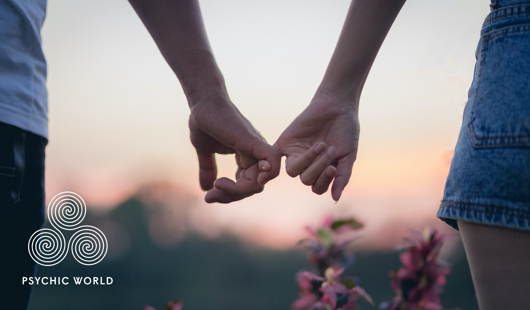 man and woman holding hands outside 